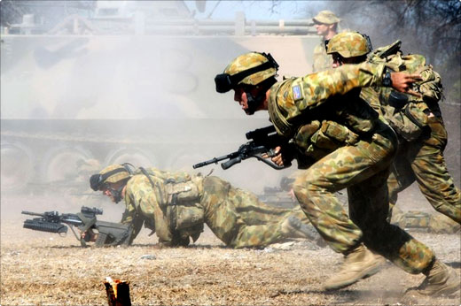 Australian soldiers in iraq under fire, they are carrying the flames of the ANZACs and freeing this world of terrorism.