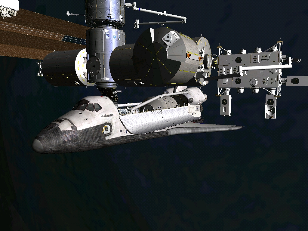 STS 135 docked